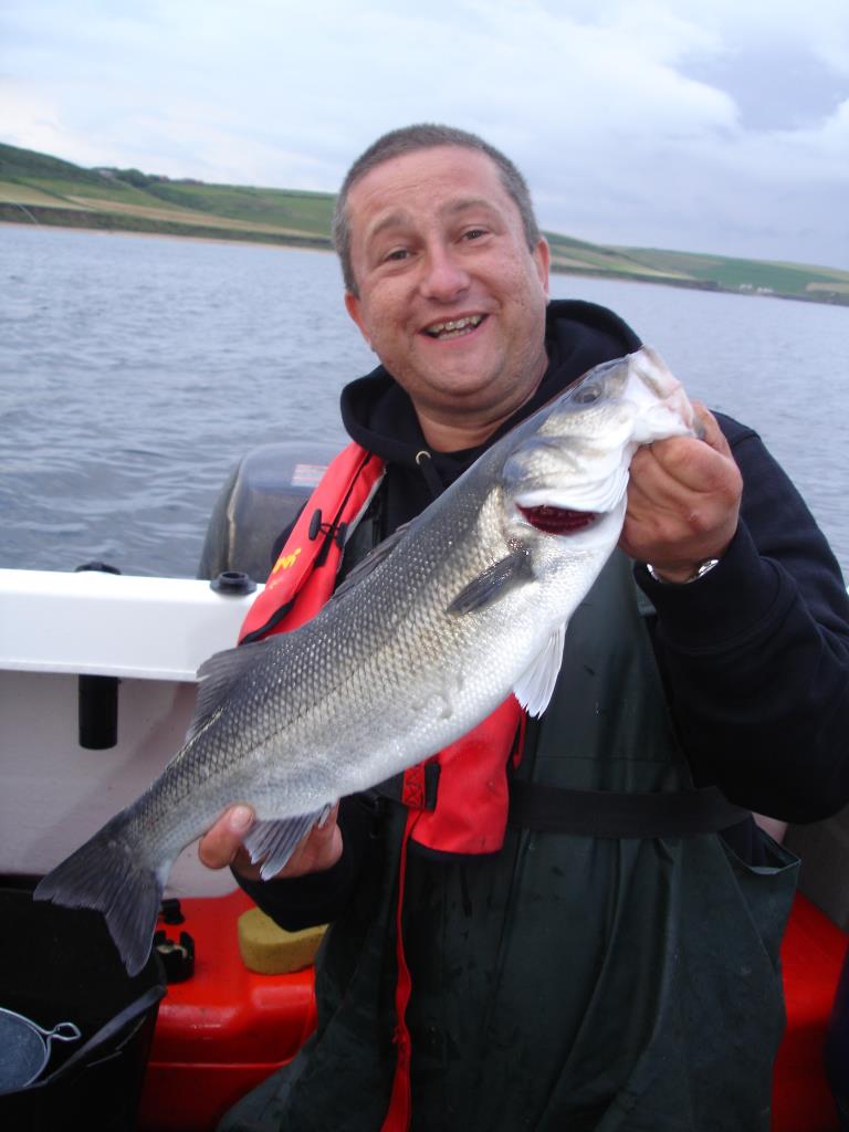 Robert with a fine fish from the outer shoreline